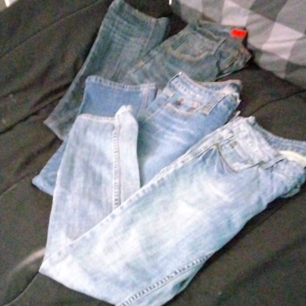 3 women pair of Levi jeans